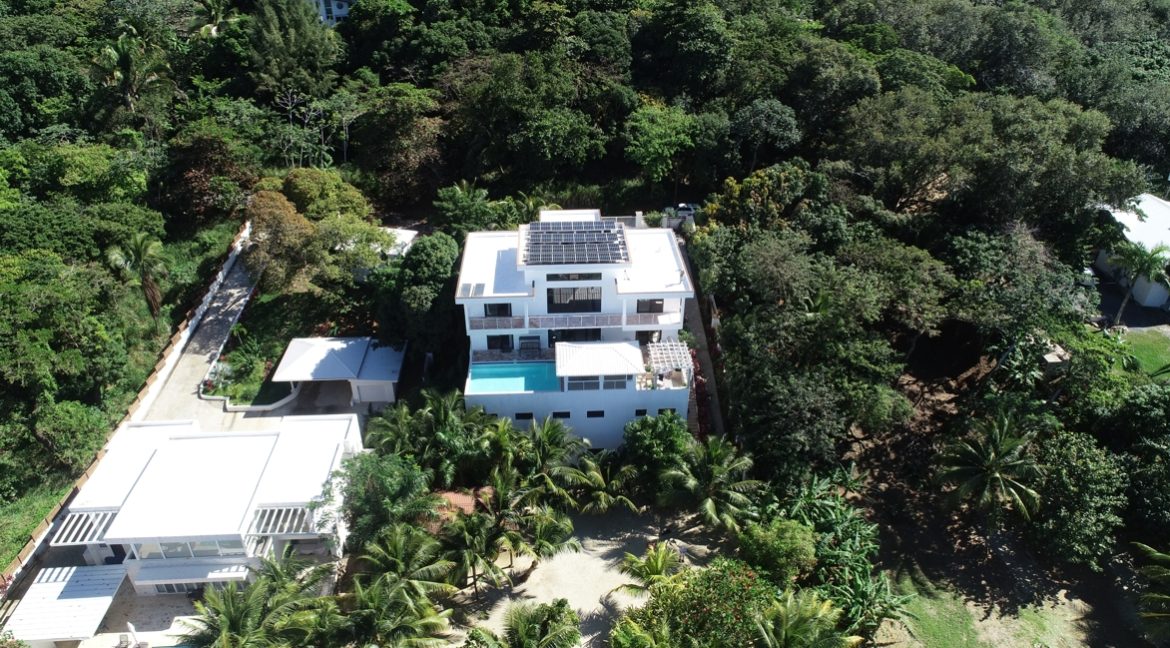 Aerial view with solar panels on roof